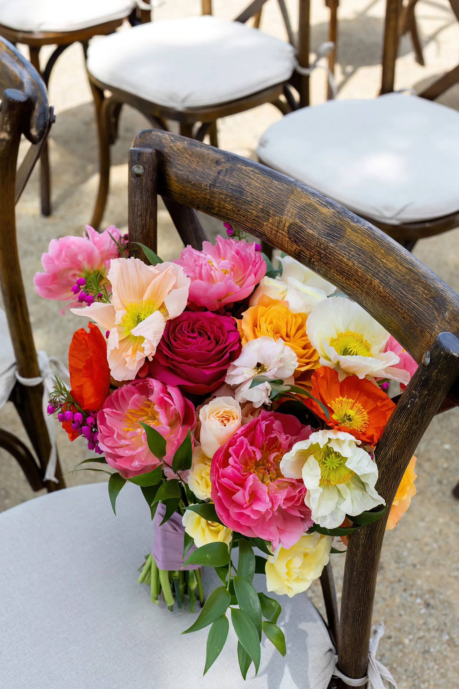pink, yellow, white, and red bridal bouquet