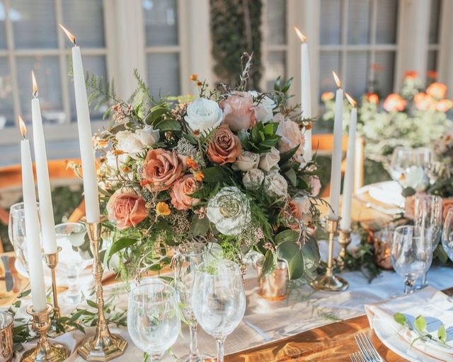 rust red and white rose floral centerpiece
